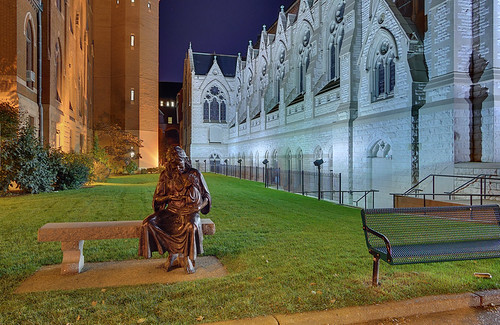 Statue of the Sacred Heart of Jesus, at Saint Louis University, in Saint Louis, Missouri, USA - view at night