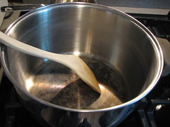 Good large flat-bottomed pot & wooden stirrer