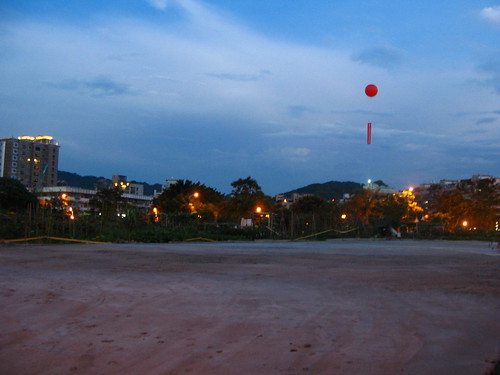 the space and a red balloon