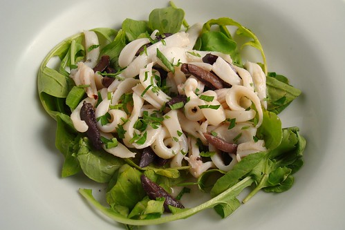 Calamari Noodles with Olives Over Arugula