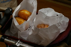 A dozen donuts in the rando bag