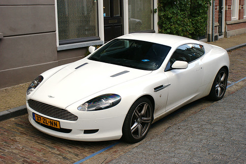 in order and yes i do like white cars aston martin db9 