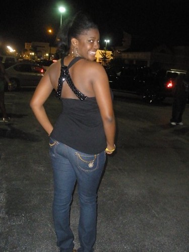 Ebony beauty posing the back of her denim jeans