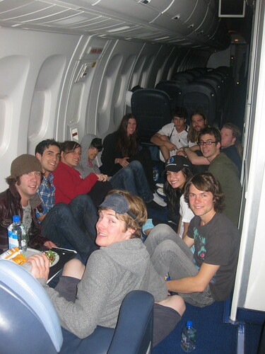 picture of joe jonas nick jonas and demi lovato on a plane with their 