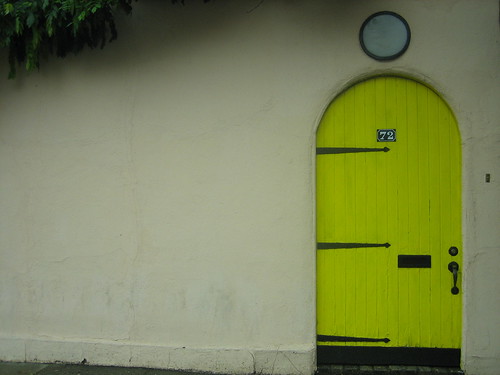 through the yellow door.