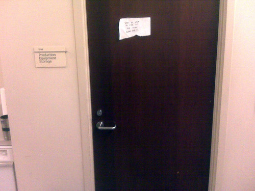 Door with makeshift sign