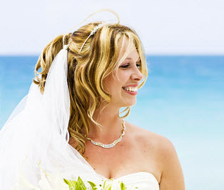 Smiling Bride With Her Beach Wedding Dress