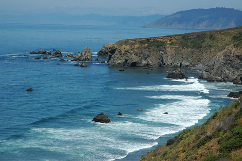Rural California coastline, cliffs, overhang, waves, blue water, Pacific Ocean, north of Fort Bragg, California, USA by Wonderlane