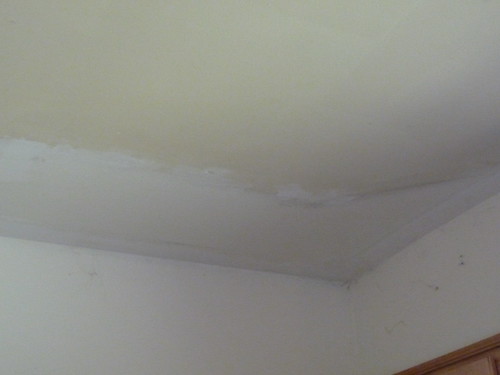 unpainted ceiling in kitchen/dining