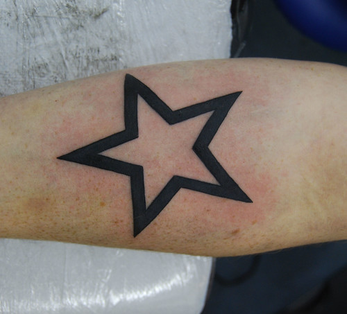 star outline tattoo. star tattoo