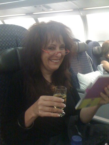 Wine service and my dorky reading glasses enroute toamsterdam