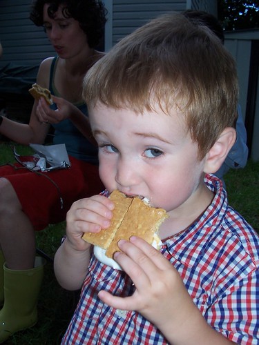 sonny enjoying a s'more (waldie is too)