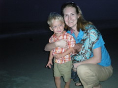 Noah's first time seeing the beach; at night time.