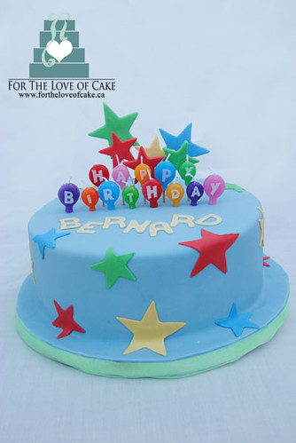 birthday cake with stars created by www.fortheloveofcake.ca