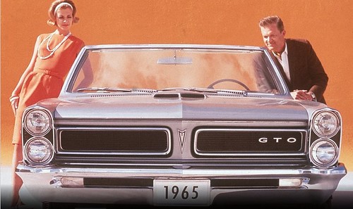 A 1965 Pontiac GTO unveiled at an automobile show