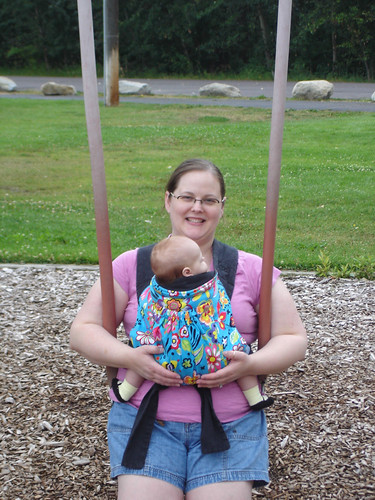 with Mommy, first time on the swing