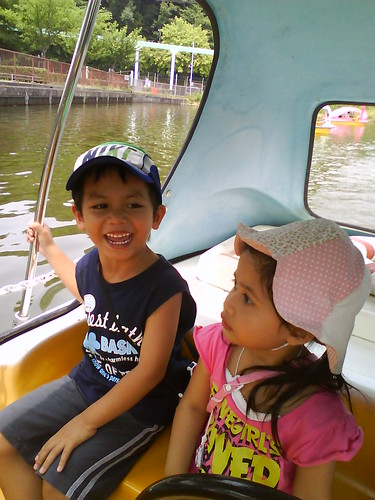 Happy in the paddling boat