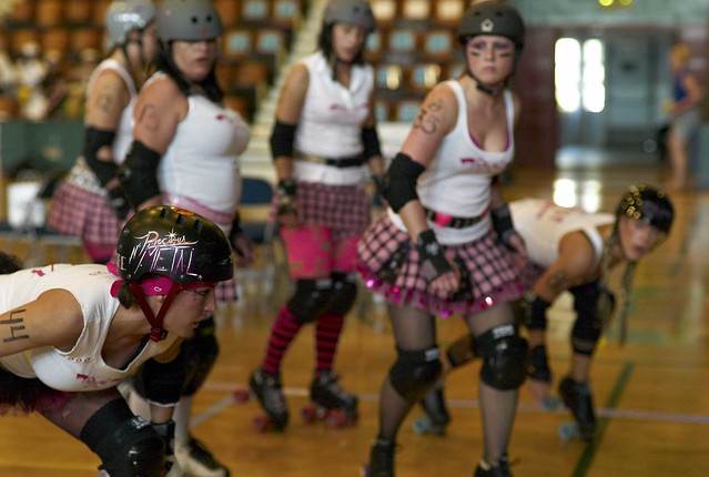 Precious N Metal and the rest of the Pink Pistols do warm up drills before the big bout