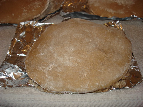 A pita cooling outside the oven