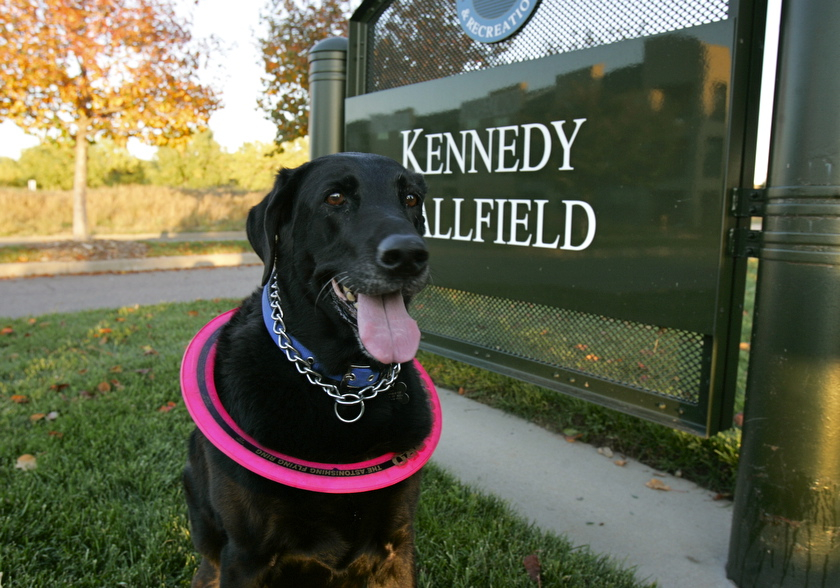 Cali in front of sign for ballfields