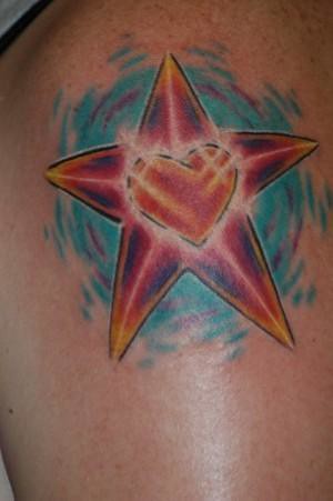 Star tattoo by thomas jacobson. tattoo done by Thomas Jacobson at bad dog 