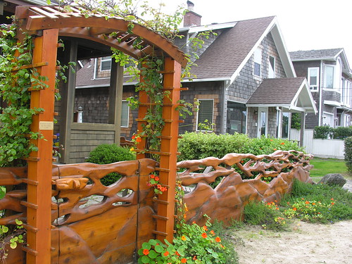 Artistically carved gate and fence on Cannon Beach street