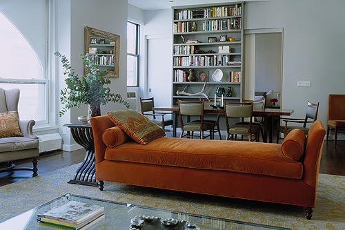 Velvet daybed + painted bookshelves in open-plan living/dining room by xJavierx