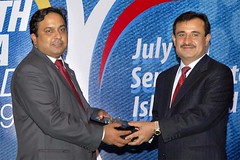 Federal Minister for Health Mir Aijaz Hussain Jakhrani giving the 1st National Innovation in Health Journalism 2009 Award to Amir Jahangir by ajjano