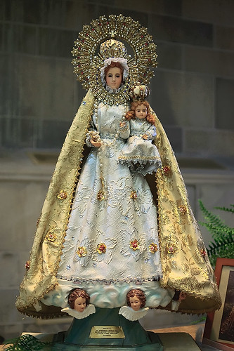 Statue made of porcelain, cloth, and gems, "Our Lady of the Philippines", made in the Philippines, from the collection of the Marianum, photographed at the Cathedral of Saint Peter, in Belleville, Illinois, USA