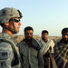 A U.S. Soldier Meets with Private Security Contractors
