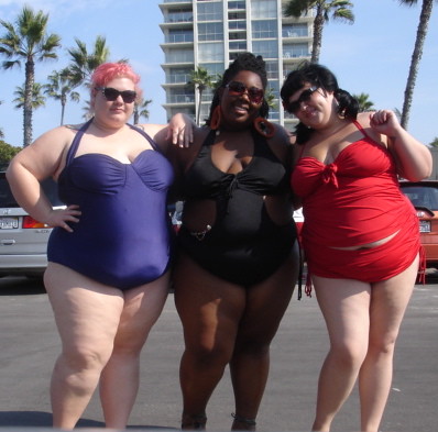 Three fat girls wearing tankinis
