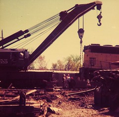 Chicago & NorthWestern Railroad freight train wreck. Geneva Illinois. April 1976.