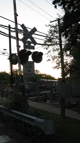 The Maple Avenue CTA railroad crossing at sunset. Wilmette Illinois. Early June 2009.