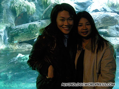 Rachel and Meiyen with the otters in the background