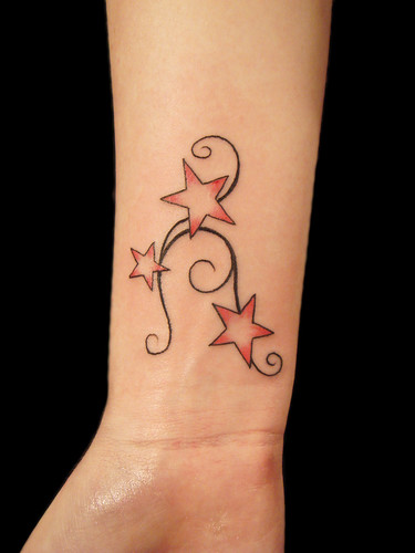 tribal angel tattoos. Star and tribal tattoo