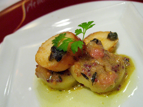 Tunisian Octopus on potato with mustard dressing. We were speaking to Carlo Catallo about wanting to try the mid course, and he sent out this extra bit for us to sample.