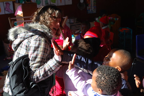 Hi-fives with pre-schoolers at Neoh ECD centre