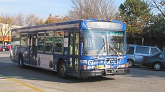 Pace route # 307 Harlem Avenue bus rounding the Conti Parkway Circle. Elmwood Park Illinois. November 2008.