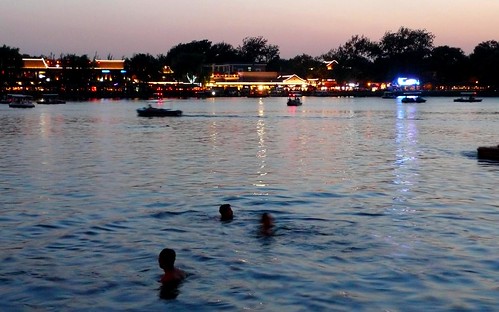 sunset swimmers in qianhai, beijing