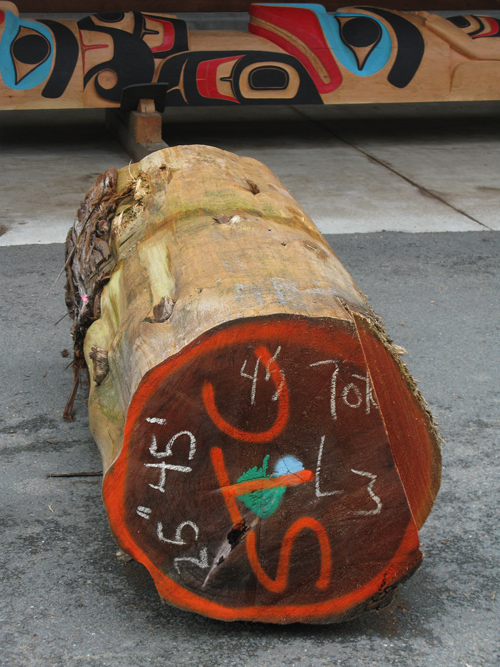 totem pole and extra log at UAS, Juneau, Alaska