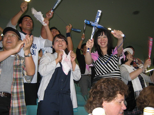 Our favorite group of bankers. Stripes, the aforementioned wife, is the one posing in the photo with her thundersticks.