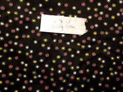 Multi dots on black quilting cotton