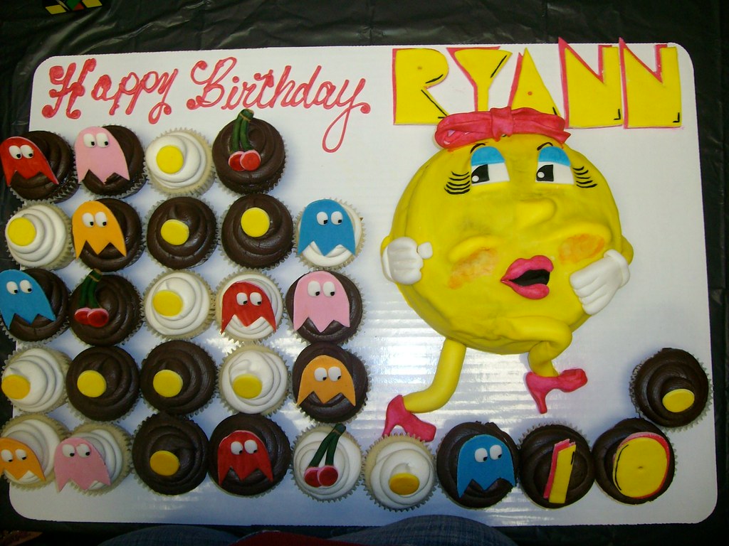 Ms. Pac Man sculpted cake with assorted cupcakes