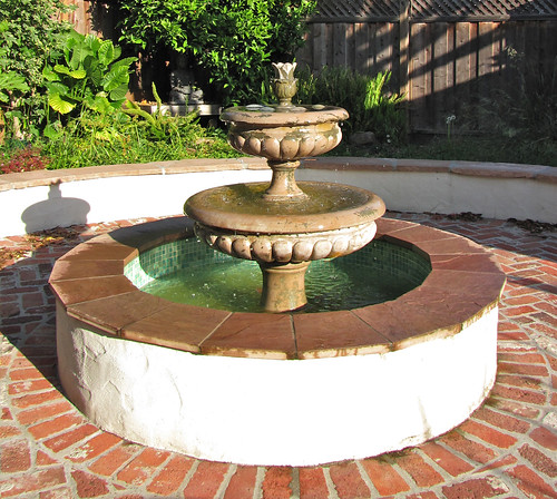 fountain in long morning light