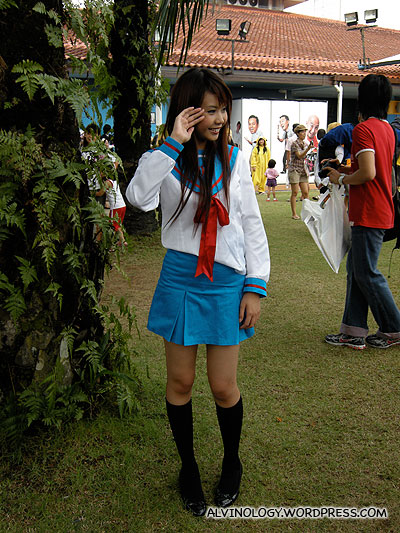 It helps to be pretty - this girl in a simple sailor uniform was attracting hounds of photographers