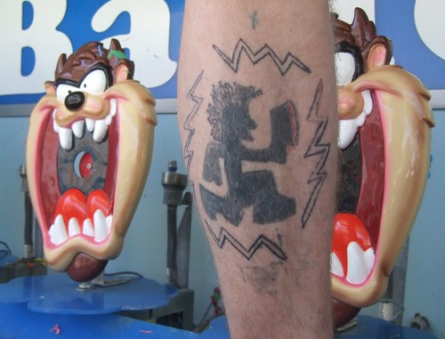 hatchet man tattoos. Man with Hatchet Tattoo