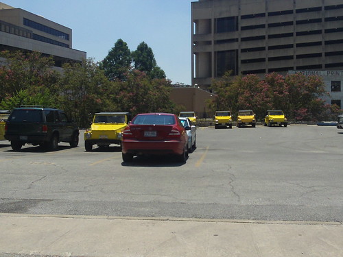 yellow cars all in a row