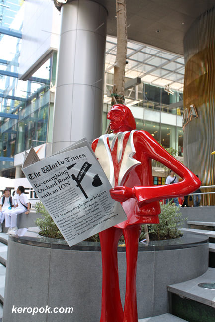 the red man reading the papers at ion