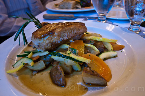 Chicken on a bed of vegetables pictures