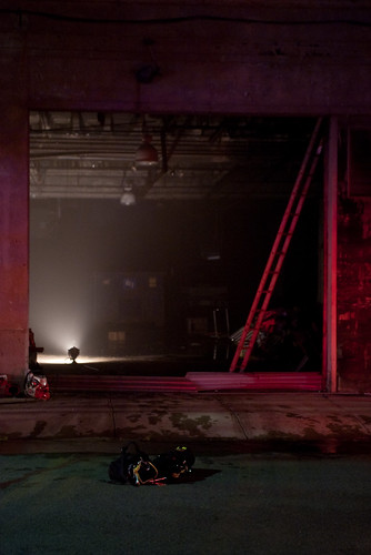 Firefighters investigate inside the building for sources of the fire